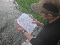 A Reboot participant studies a passage from Luke on Mount Cheaha.